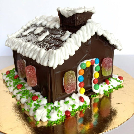 Casita navideña de chocolate rellena de dulces